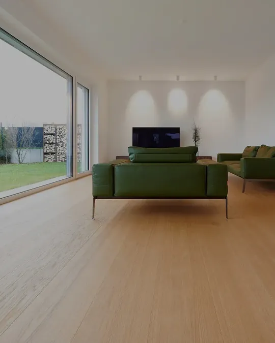 Wide engineered oak wood flooring in an open-plan living room